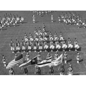  All Girl High School Band Standing in Formation on a Field 