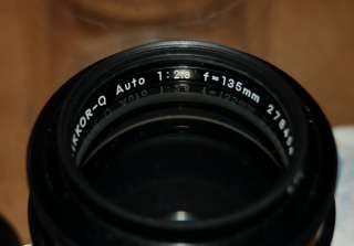Lens is in great minty shape. Very light handling marks, no optical 