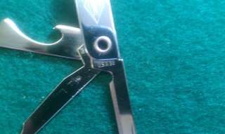   DANA advertising pocket knife, opener, file, key chain Bassett USA 89
