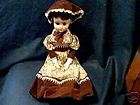 Porcelain Doll brown dress  