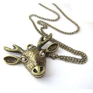 Vintage jewelry deer dangling long necklace bronze tone white diamente 