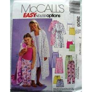  MCCALLS PATTERN 3906 AND GIRLS ROBE, BELT,TOPS, GOWN 