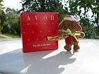 AVON MERRY MARCHERS CHRISTMAS ORNAMENT PUPPY WITH TRUMPET