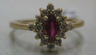 this is a lovely and dainty estate ruby and diamond