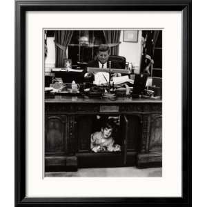 John Jr. playing under John F. Kennedys Oval Office Desk, 1963 Framed 