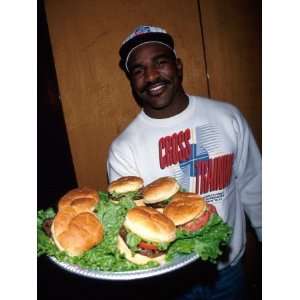  Professional Boxer Evander Holyfield Serving Up Burgers 
