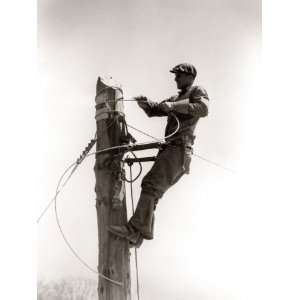  Man Worker, Working Atop Utility Pole, Installing Electric 