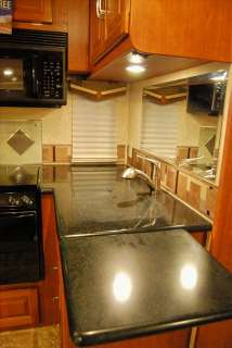 SMALL DOUBLE SLIDE CLASS A GAS RV $ REDUCED $ SHOW PRICE SMALL DOUBLE 